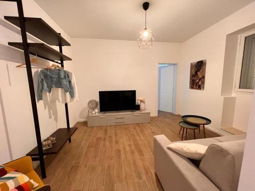 TV a/nebo společenská místnost v ubytování La casa di Detta (Le Scaramazze)