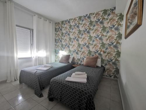 เตียงในห้องที่ Apartment Fuengirola, Torreblanca