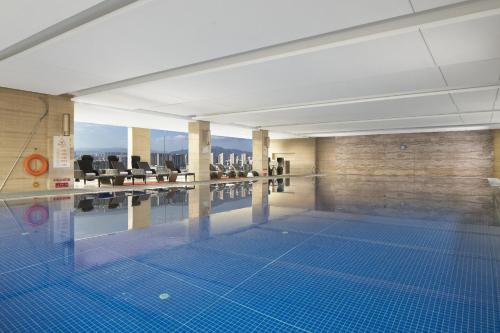 Gimnasio o instalaciones de fitness de Zhejiang Taizhou Marriott Hotel