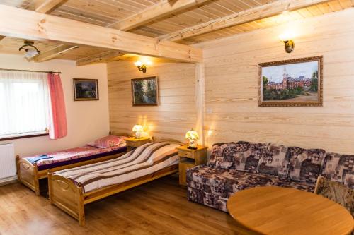 Χώρος καθιστικού στο Domek Pod Klonem Agroturystyka