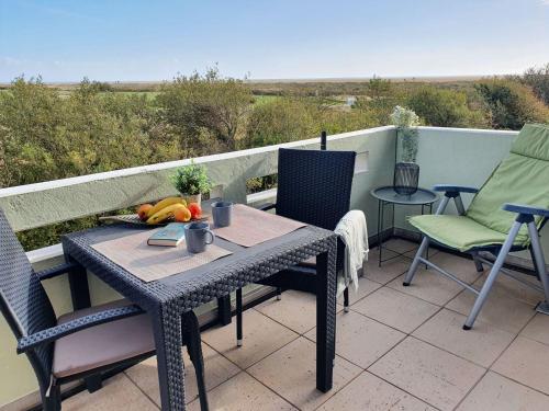 Μπαλκόνι ή βεράντα στο Haus am Golfplatz Nr 06 Ferienwohnung Strandblick