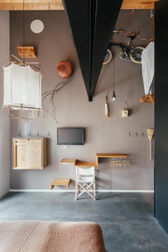 TV a/nebo společenská místnost v ubytování Design Hotel Modez