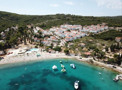 an aerial view of a beach with boats in the water at Apartment Prancic in Nečujam