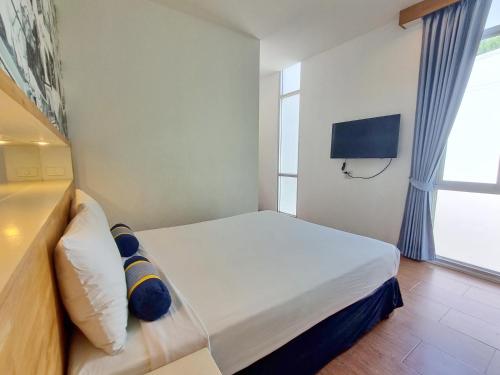 TV a/nebo společenská místnost v ubytování MAR24 Koh Tao Hotel