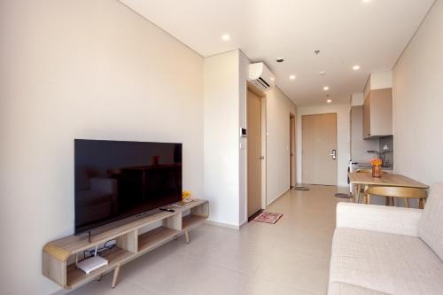 TV i/ili multimedijalni sistem u objektu Căn Hộ Cao Cấp The Sóng Vũng Tàu - TripTrip Homestay Apartment