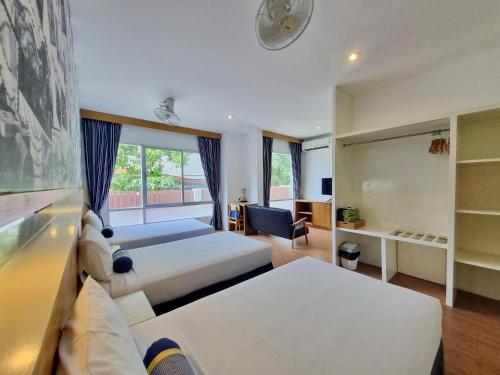 Postel nebo postele na pokoji v ubytování MAR24 Koh Tao Hotel