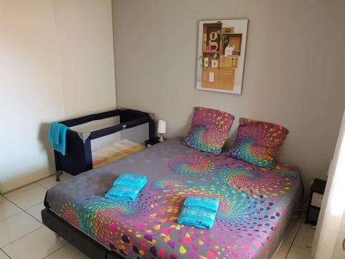 En eller flere senge i et værelse på Domaine Juan Flore