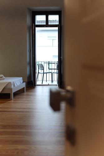 Ένα ή περισσότερα κρεβάτια σε δωμάτιο στο Gli Appartamentini del Bistrot dei Vinai