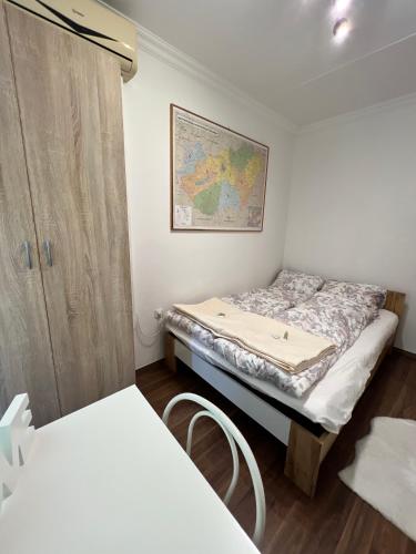 เตียงในห้องที่ Meszlényi-Apartman II