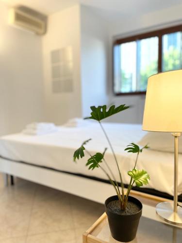 Ένα ή περισσότερα κρεβάτια σε δωμάτιο στο Casa Paradiso: Un'oasi di relax