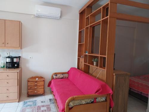 A bed or beds in a room at Κηπούπολη Kepoupolis Apartment