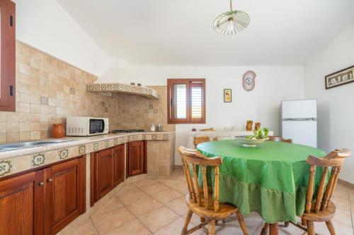 Kuchyň nebo kuchyňský kout v ubytování Casa Cala Lunga