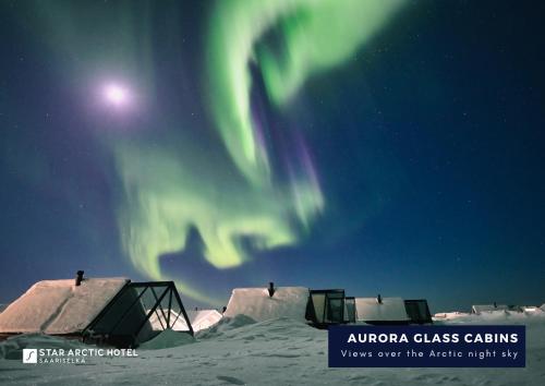 an aurora class calarswave over thectic night sky at Star Arctic Hotel in Saariselka
