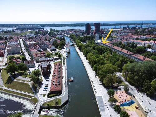 an aerial view of a city with a river at Great View Studio, self check in, free parking in Klaipėda