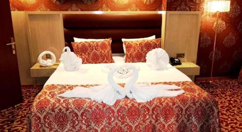 Ein Bett oder Betten in einem Zimmer der Unterkunft Savona Otel Sivas