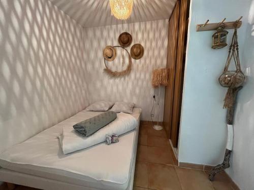 Ένα ή περισσότερα κρεβάτια σε δωμάτιο στο Casa Romy