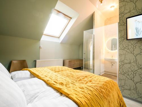 Voodi või voodid majutusasutuse Stuckhotel Fettehenne toas