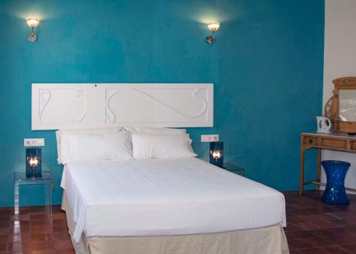 Postel nebo postele na pokoji v ubytování Boutique Hotel RifugioAzul