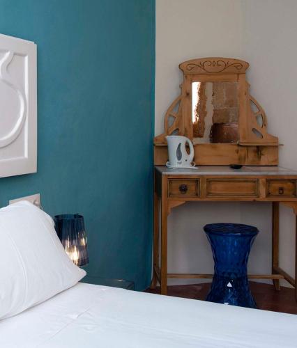 Postel nebo postele na pokoji v ubytování Boutique Hotel RifugioAzul