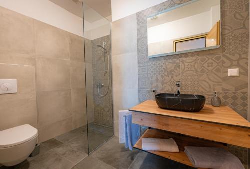 Ein Badezimmer in der Unterkunft Lorettohof Hotel Garni