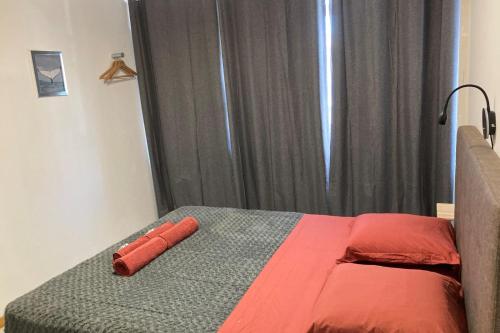 Postel nebo postele na pokoji v ubytování "Tiaré" city center room