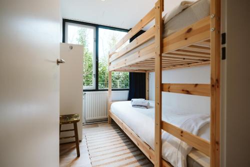Tempat tidur susun dalam kamar di Jonkerstee 59 - Ouddorp - not for companies