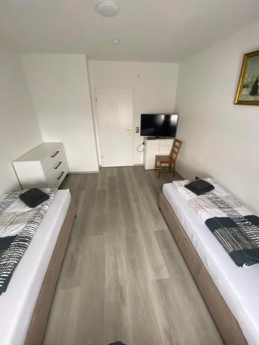 Телевизор и/или развлекательный центр в Apartments Feniks