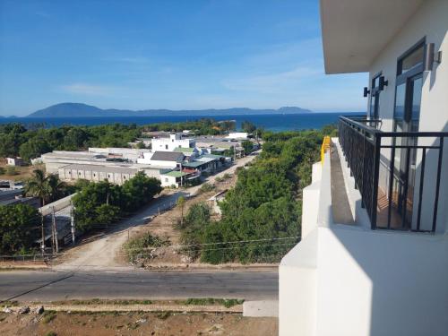 a view from the balcony of a white building at Khách sạn AN THỊNH 2 in Doc Let