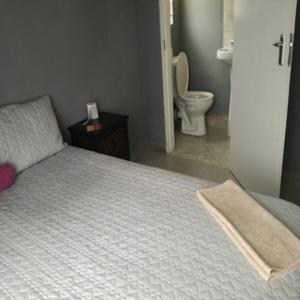 Katil atau katil-katil dalam bilik di Savet Lodge