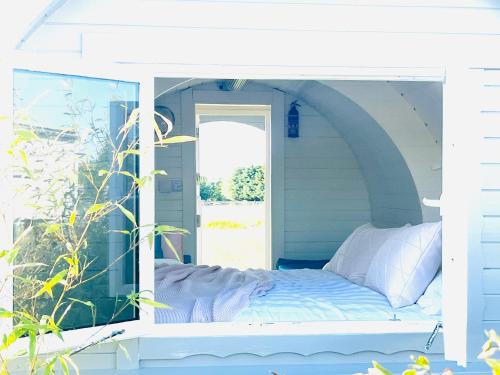 Кровать или кровати в номере Charming Lodge in Morpeth