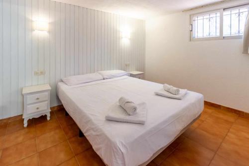 Posteľ alebo postele v izbe v ubytovaní Carrilet 37 bxs Apartamento con terraza