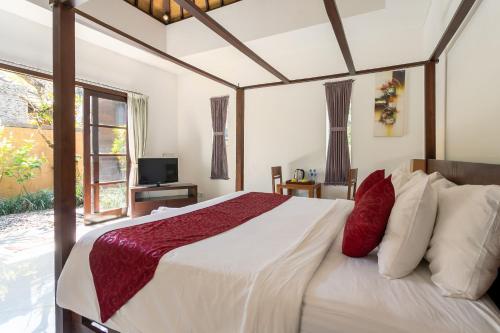 Letto o letti in una camera di Sukanami Villa Ubud by ecommerceloka