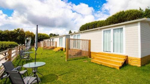 Zahrada ubytování Somo Bungalow Resort - Camping Latas
