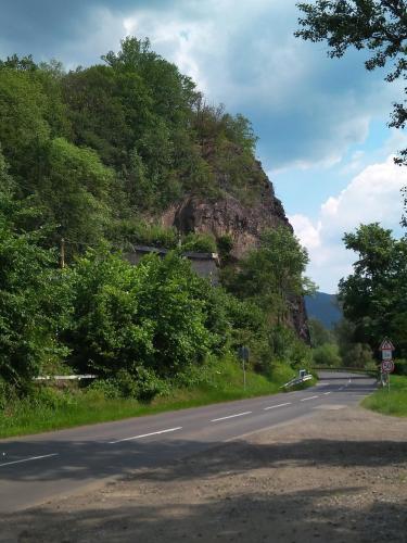 a road with a mountain on the side of it at apartman.lara in Děčín