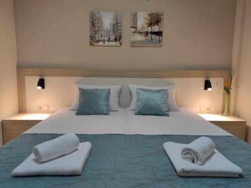 Postel nebo postele na pokoji v ubytování Guest House Nova
