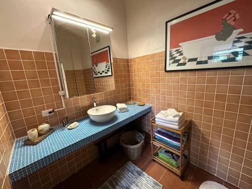 a bathroom with a sink and a mirror at Charming 1-Bed Studio in Simpson Bay - Beacon Hill in Simpson Bay