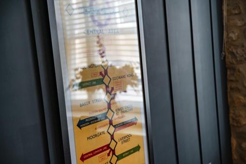 a display case with a map of spain at Spacious, luxury town centre Granary conversion in Stamford