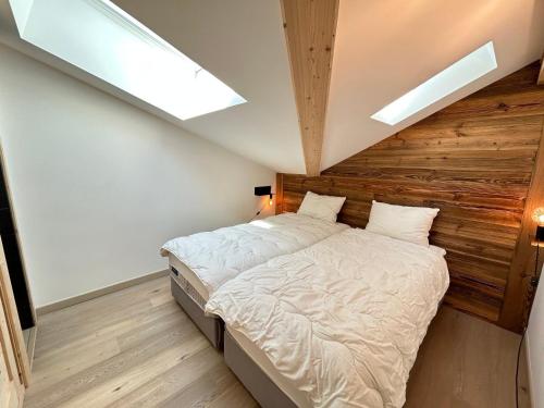 Ένα ή περισσότερα κρεβάτια σε δωμάτιο στο Superbe duplex central avec accès Spa, terrasse et parking - FR-1-623-288