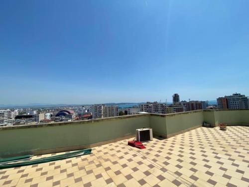 a view of a roof with a view of a city at StartApart City Center in Durrës