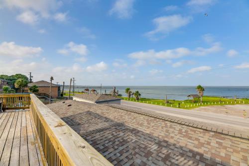 a boardwalk on the beach with the ocean in the background at Rockport Unit with Pools and Boat Ramp - Near Beaches! in Rockport