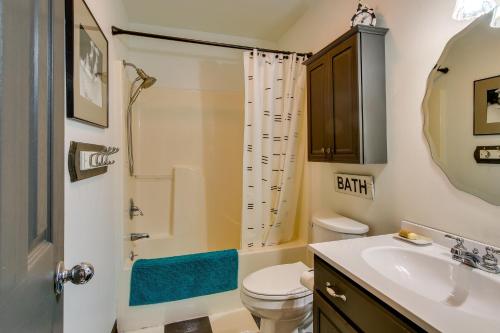 a bathroom with a sink and a toilet and a shower at Killen Vacation Rental Walk to Wilson Lake! in Killen
