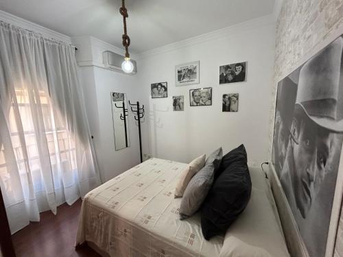 Posteľ alebo postele v izbe v ubytovaní Elegante Apartamento Centro Histórico de Málaga