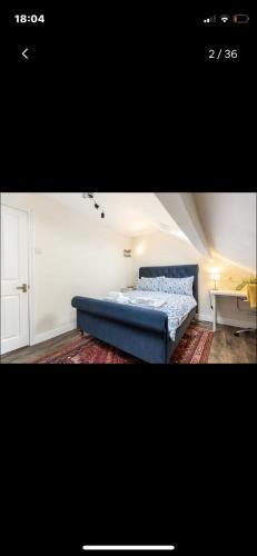 Ένα ή περισσότερα κρεβάτια σε δωμάτιο στο Stonefall Home Stay