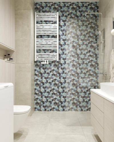 a bathroom with a toilet and a glass shower at Stacja Baltic Twins in Sztutowo