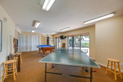 a ping pong room with a ping pong table in it at Marco Island Condo with Ocean Views and Resort Perks! in Marco Island