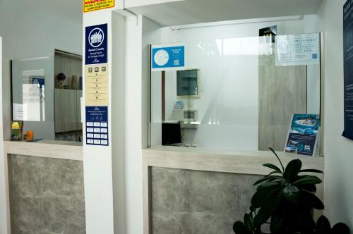 a display window in a store with a mirror at Rio Hotel in Kardamaina