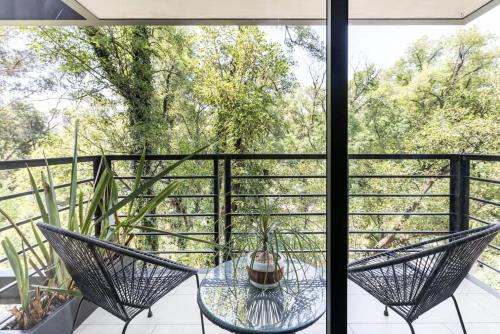 En balkong eller terrasse på Amazing 2BR view to Parque España in Condesa