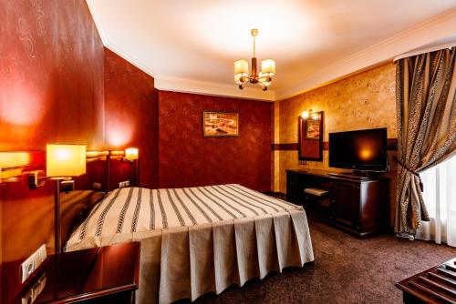 TV a/nebo společenská místnost v ubytování President Resort Hotel