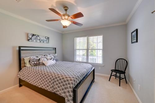 a bedroom with a bed and a ceiling fan at 1-Acre Family Home with Pool about 11 Mi to Greensboro in Monticello