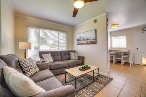 a living room with a couch and a table at 17 Mi to Lake Tahoe Carson City Home with Yard in Carson City